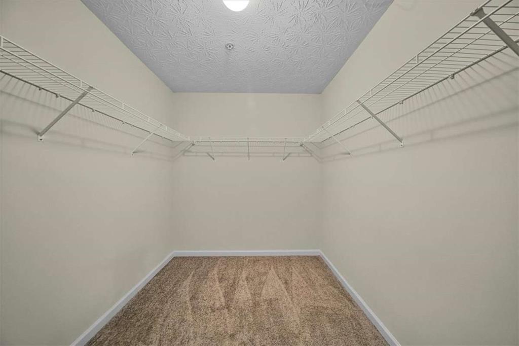 3834 Augustine Place Rex, GA 30273 - Photo 38 of 41 a view of a room with racks on the wall