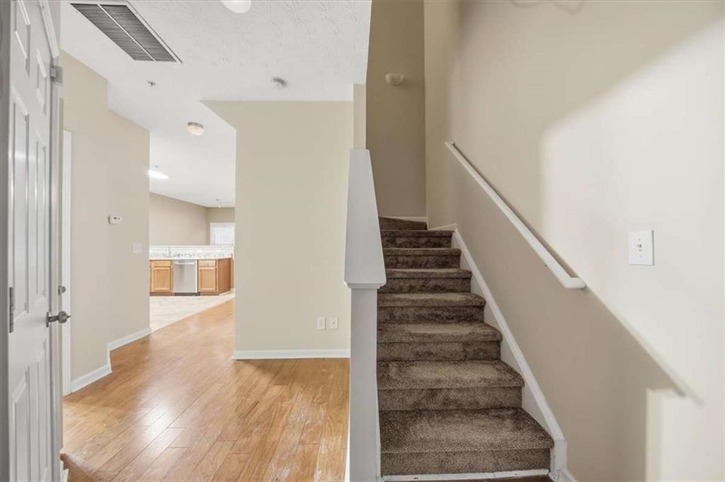 3834 Augustine Place Rex, GA 30273 - Photo 5 of 41 a view of a hallway with wooden floor and entryway
