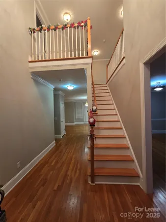 a view of entryway with wooden floor