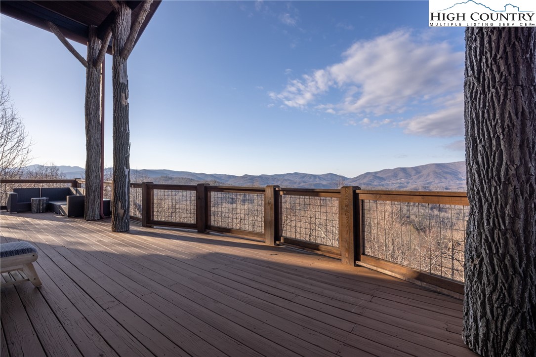 Heritage Ridge Road, Unit H12 Elk Park, NC 28622 - Photo 17 of 29 a view of an empty room with wooden floor and a window