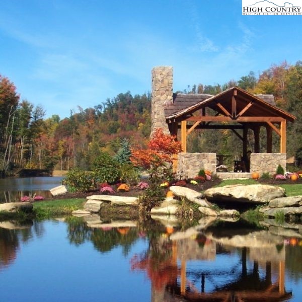 Heritage Ridge Road, Unit H12 Elk Park, NC 28622 - Photo 19 of 29 a front view of a house with garden