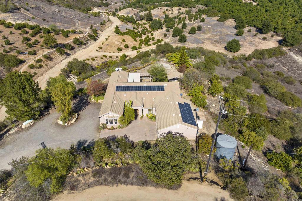 2344 Eric Road Fallbrook, CA 92028 - Photo 1 of 1 an aerial view of a house with a yard and sitting space