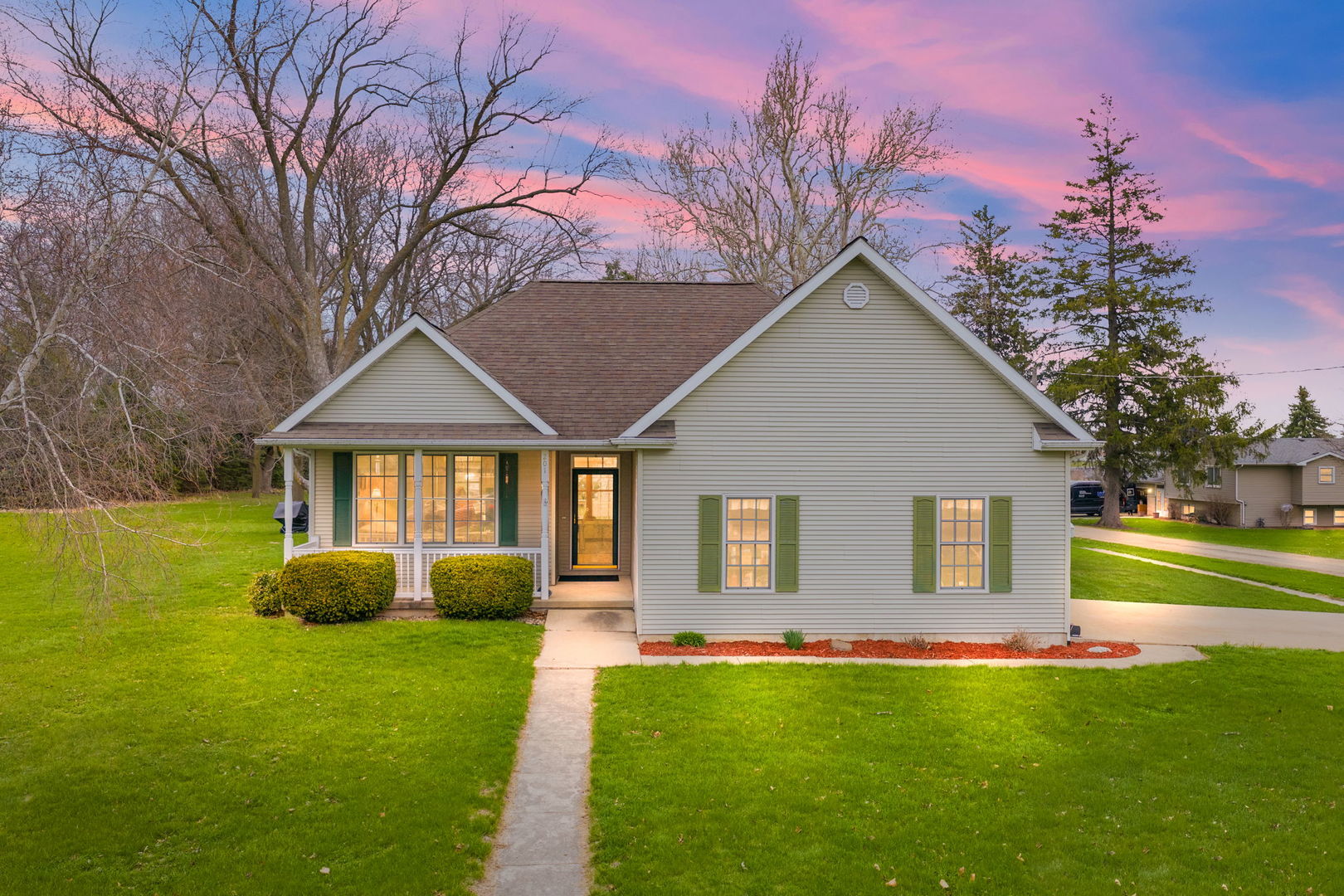 201 West Hardanger Gate Lee, IL 60530 - Photo 1 of 37 a front view of a house with garden