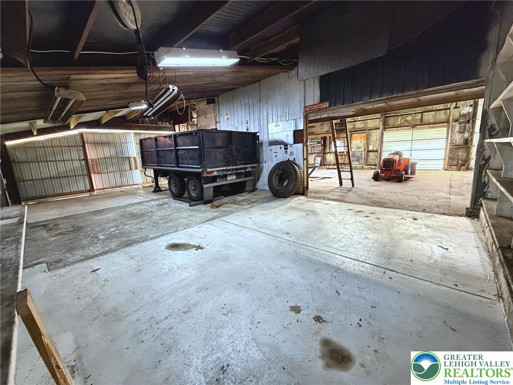 4995 Mountain Road Slatington, PA 18080 - Photo 26 of 30 Secure, spacious garage for vehicle and equipment storage.