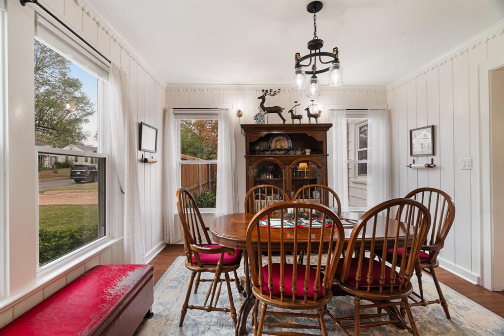 2257 Cleveland Street Paris, TX 75460 - Photo 3 of 39 Dining room featuring wood finished floors, a chandelier, and ornamental molding