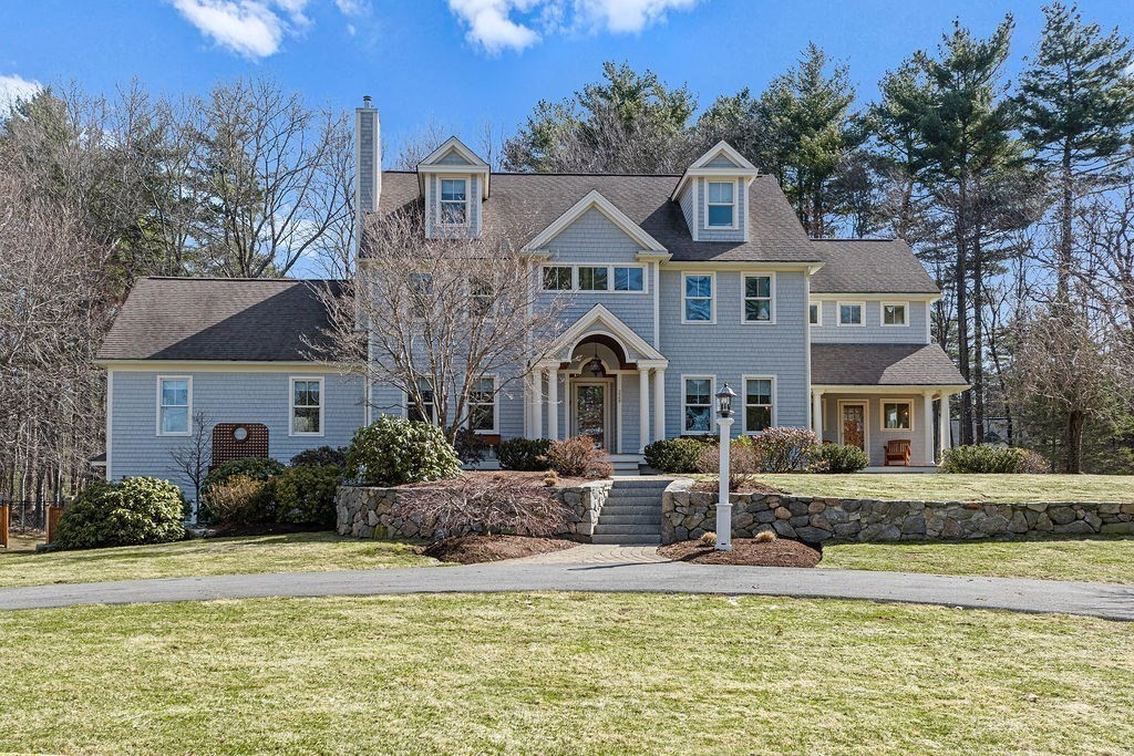 228 Mossman Road Sudbury, MA 01776 - Photo 1 of 42 a front view of a house with a yard