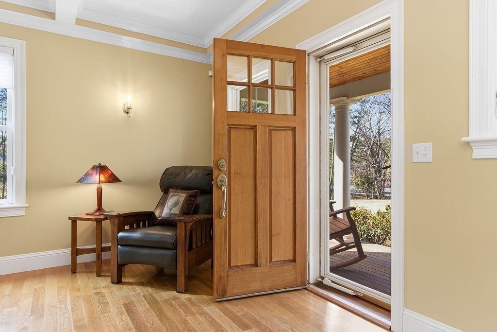 228 Mossman Road Sudbury, MA 01776 - Photo 22 of 42 a view of a livingroom with furniture and hardwood floor