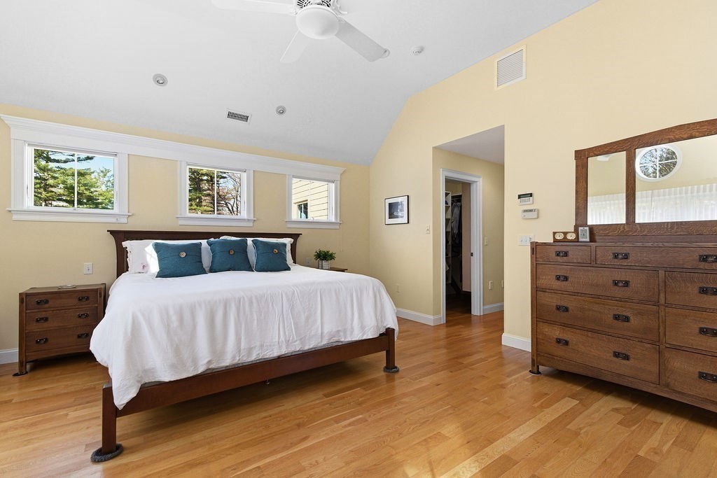 228 Mossman Road Sudbury, MA 01776 - Photo 27 of 42 a bedroom with a bed and a dresser