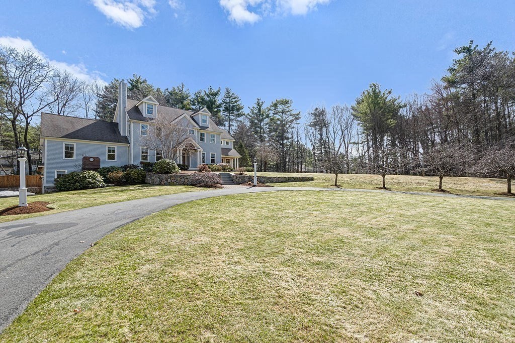 228 Mossman Road Sudbury, MA 01776 - Photo 3 of 42 a swimming pool with outdoor seating and yard