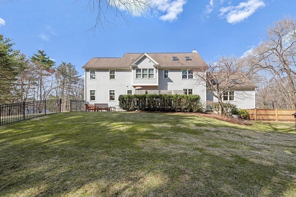 228 Mossman Road Sudbury, MA 01776 - Photo 40 of 42 a front view of a house with a garden