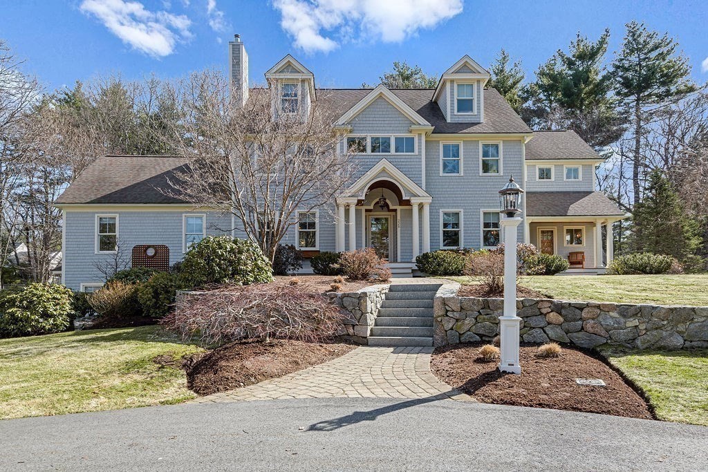 228 Mossman Road Sudbury, MA 01776 - Photo 42 of 42 a front view of a house with garden