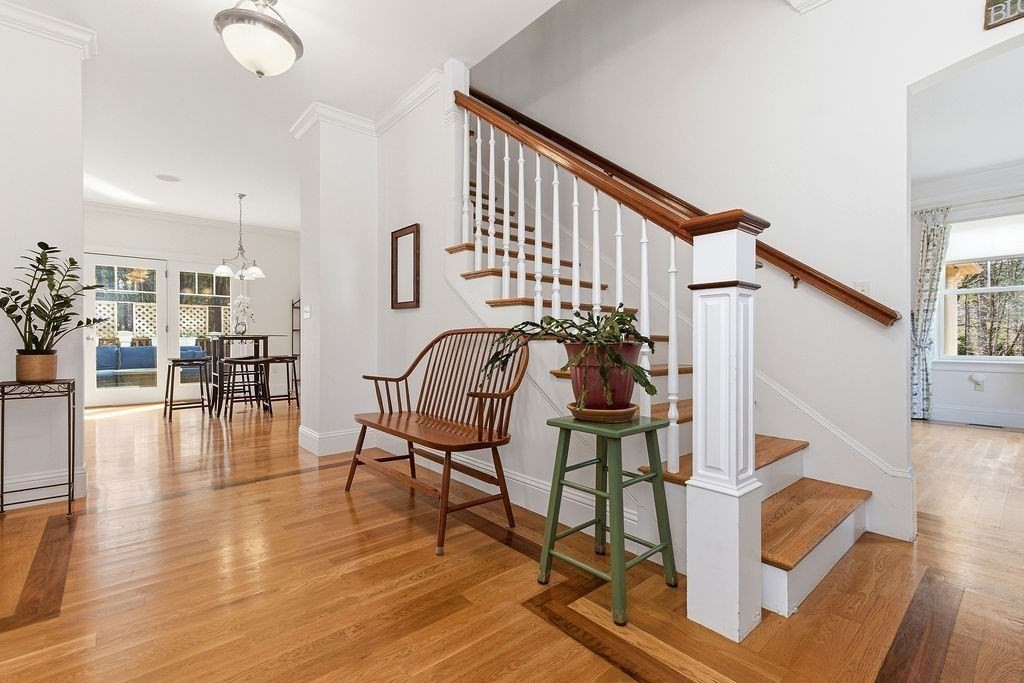 228 Mossman Road Sudbury, MA 01776 - Photo 7 of 42 a view of entryway livingroom and hall with wooden floor