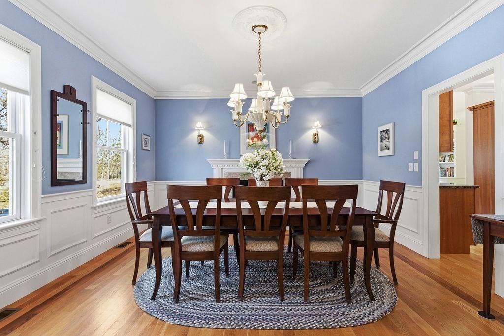 228 Mossman Road Sudbury, MA 01776 - Photo 8 of 42 a view of a dining room with furniture window and wooden floor