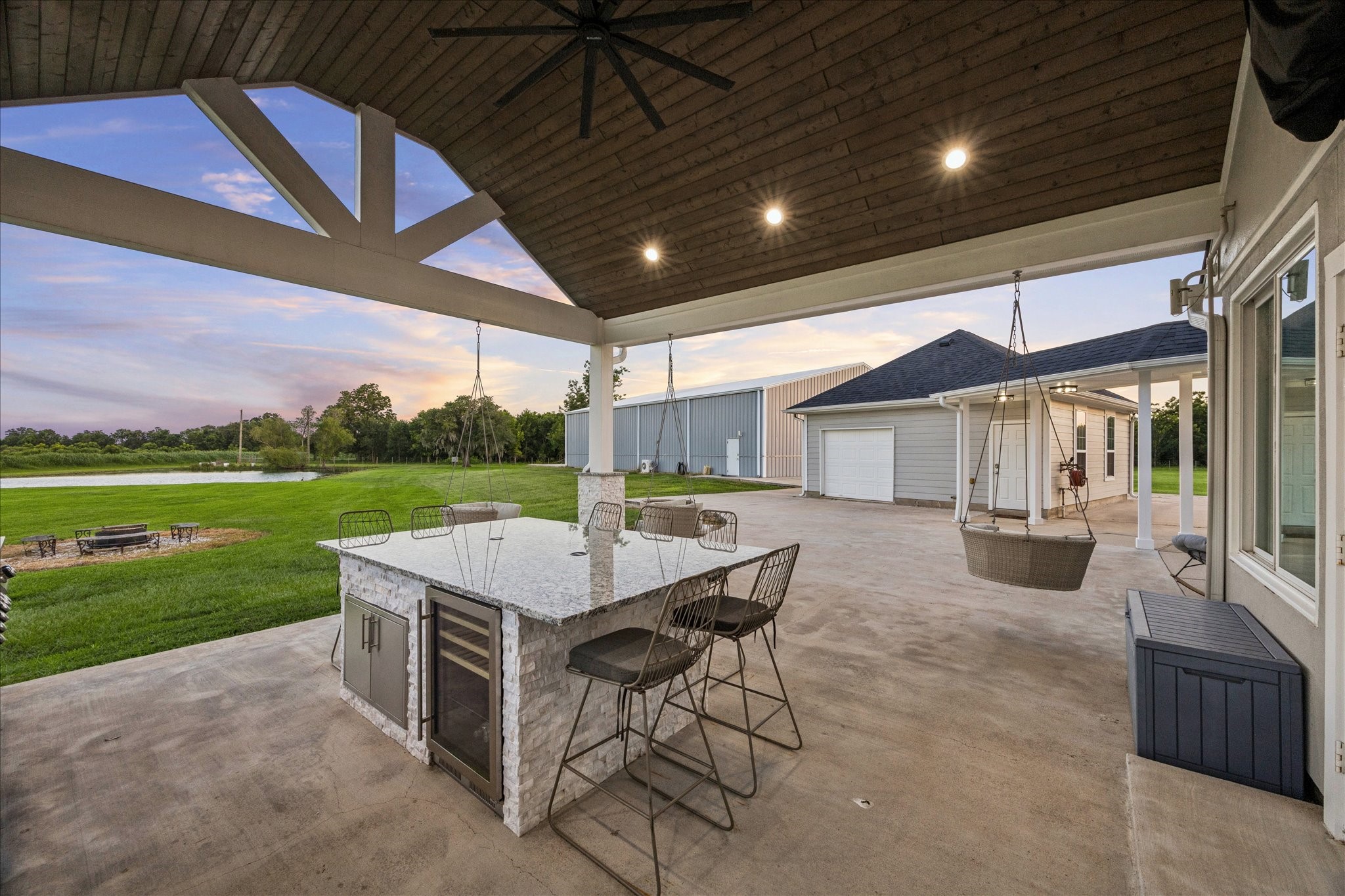 2702 Horseshoe Lane Rosharon, TX 77583 - Photo 36 of 43 Spacious covered patio seamlessly connects indoor and outdoor living.