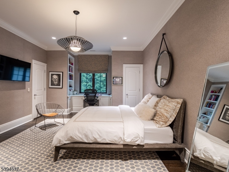 7 Stokes Farm Road Old Tappan, NJ 07675 - Photo 15 of 43 a bedroom with a bed and ceiling fan