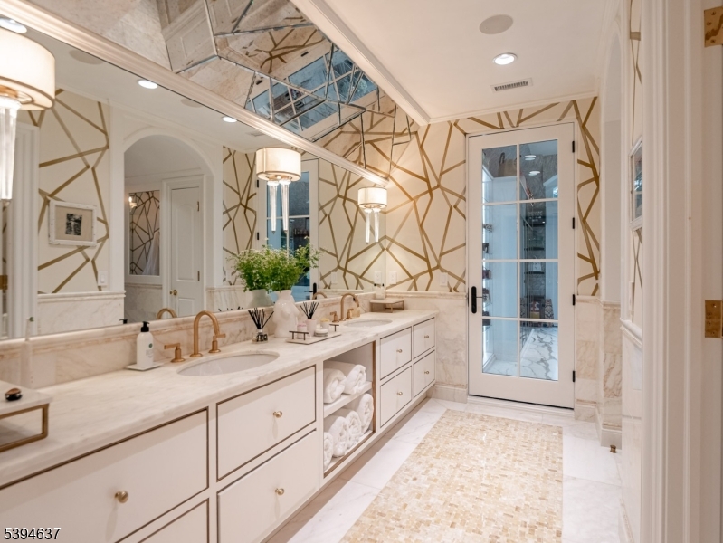 7 Stokes Farm Road Old Tappan, NJ 07675 - Photo 28 of 43 a bathroom with a double vanity sink mirror and