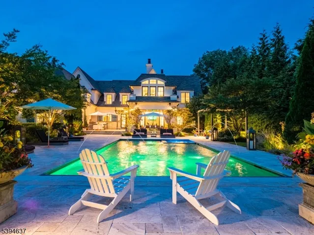 a view of a chairs and table in the patio
