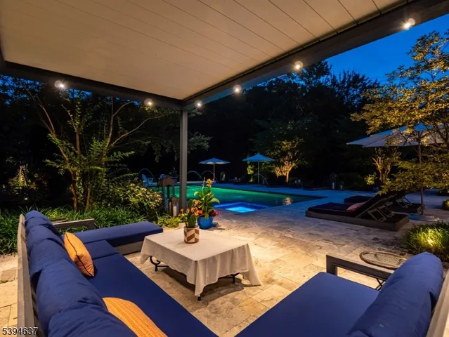 a view of a chairs and tables in the patio