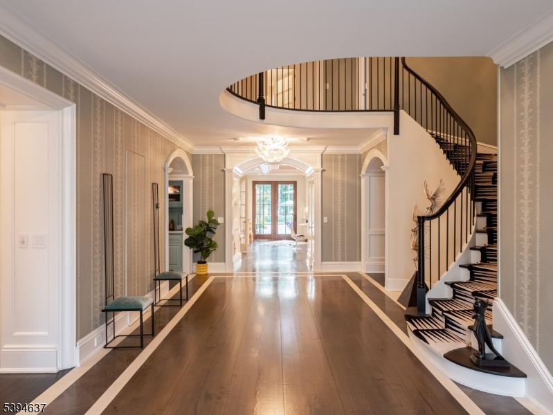 7 Stokes Farm Road Old Tappan, NJ 07675 - Photo 4 of 43 a view of an entryway with wooden floor and door