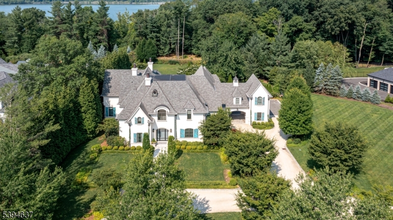 7 Stokes Farm Road Old Tappan, NJ 07675 - Photo 43 of 43 an aerial view of residential houses with outdoor space and trees all around