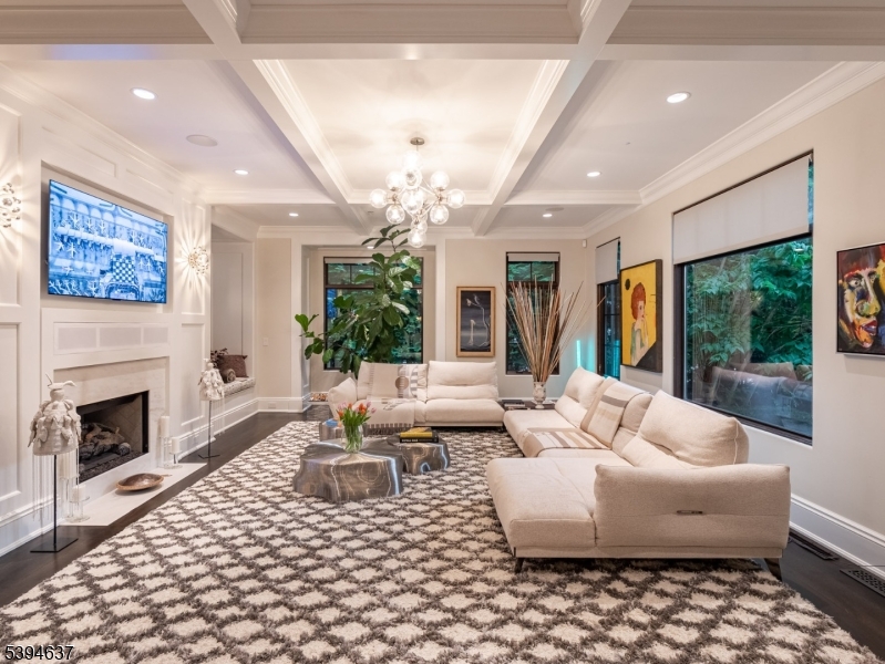 7 Stokes Farm Road Old Tappan, NJ 07675 - Photo 8 of 43 a living room with furniture and a fireplace