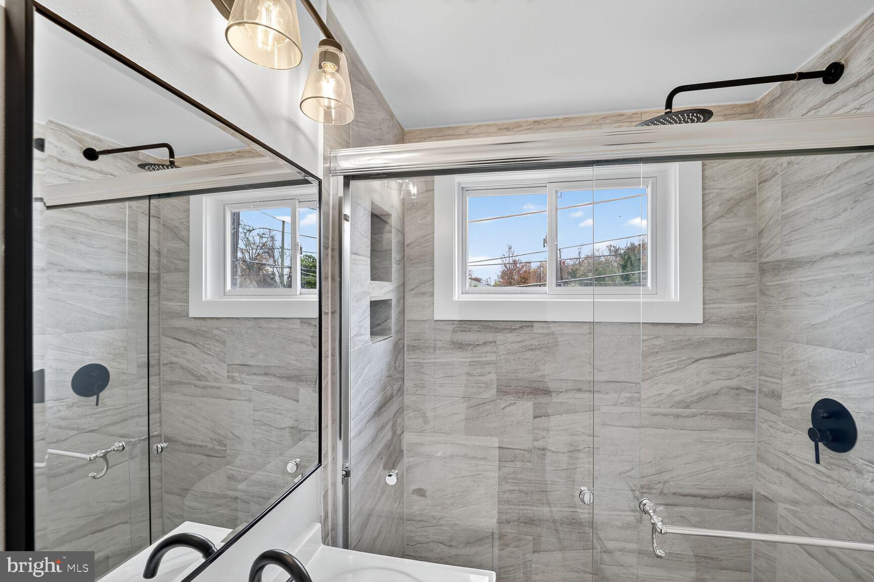 404 Kerby Hill Road Fort Washington, MD 20744 - Photo 13 of 24 a bathroom with a shower