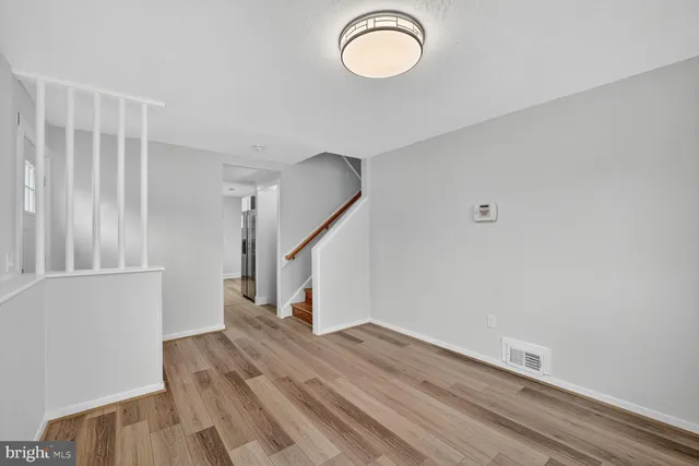 a view of entryway with wooden floor