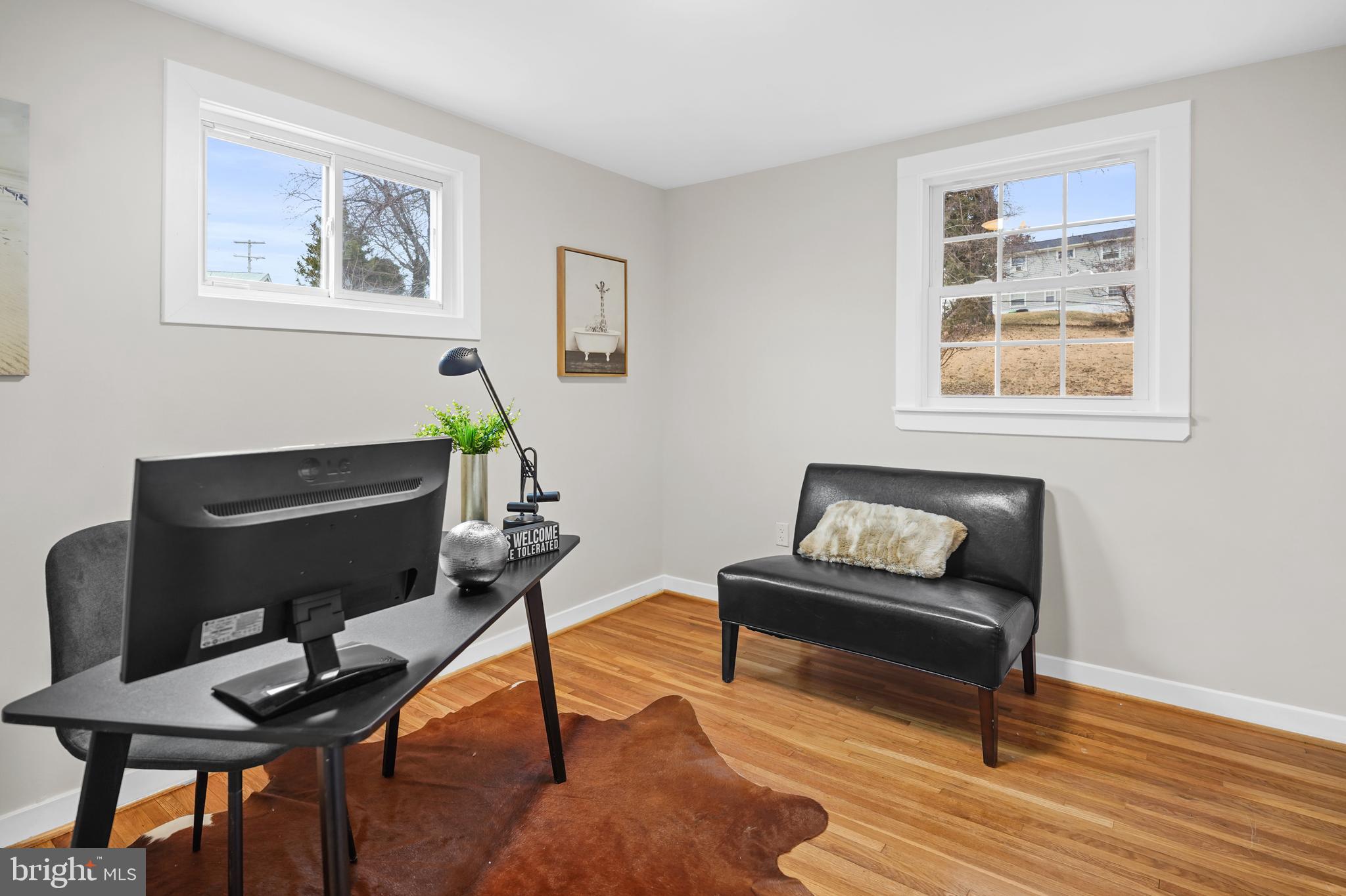 404 Kerby Hill Road Fort Washington, MD 20744 - Photo 7 of 24 a living room with furniture and a wooden floor