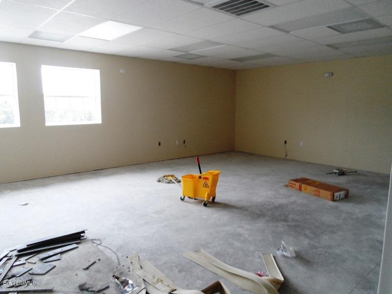 5132 Minton Road, Unit 6 Palm Bay, FL 32907 - Photo 12 of 15 an empty room with windows