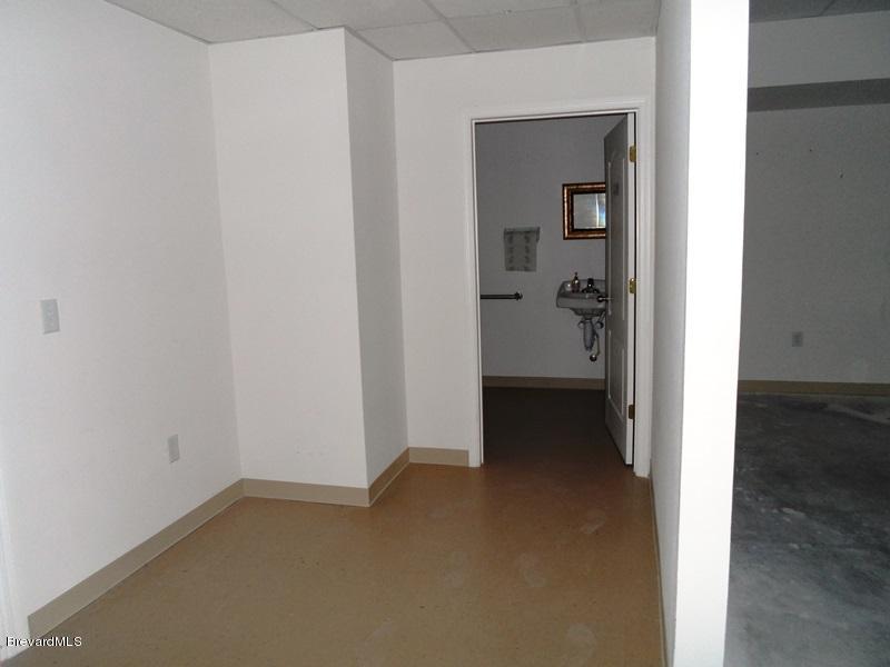 5132 Minton Road, Unit 6 Palm Bay, FL 32907 - Photo 3 of 15 a view of a room with a hallway