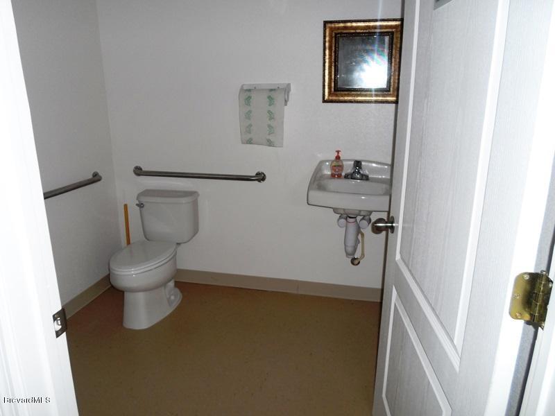 5132 Minton Road, Unit 6 Palm Bay, FL 32907 - Photo 5 of 15 a bathroom with a toilet