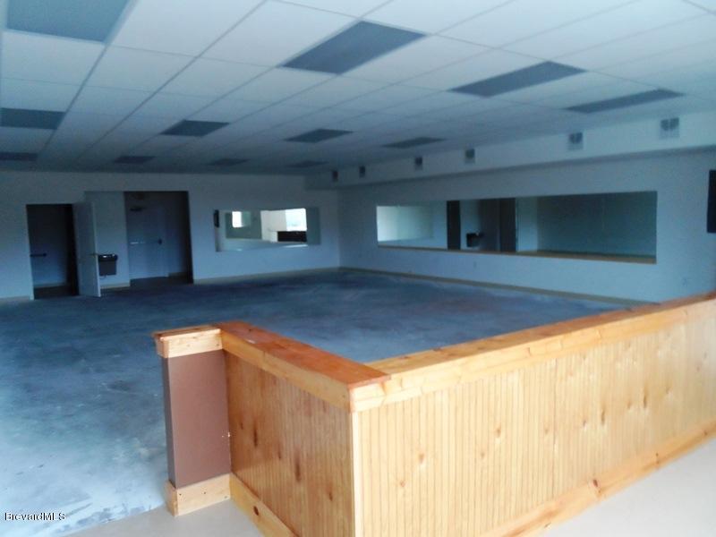5132 Minton Road, Unit 6 Palm Bay, FL 32907 - Photo 9 of 15 a view of empty room with wooden floor