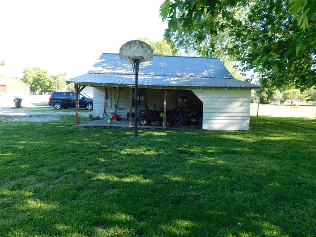 1301 East Main Street Casey, IL 62420 - Photo 12 of 14 a view of a house with a yard