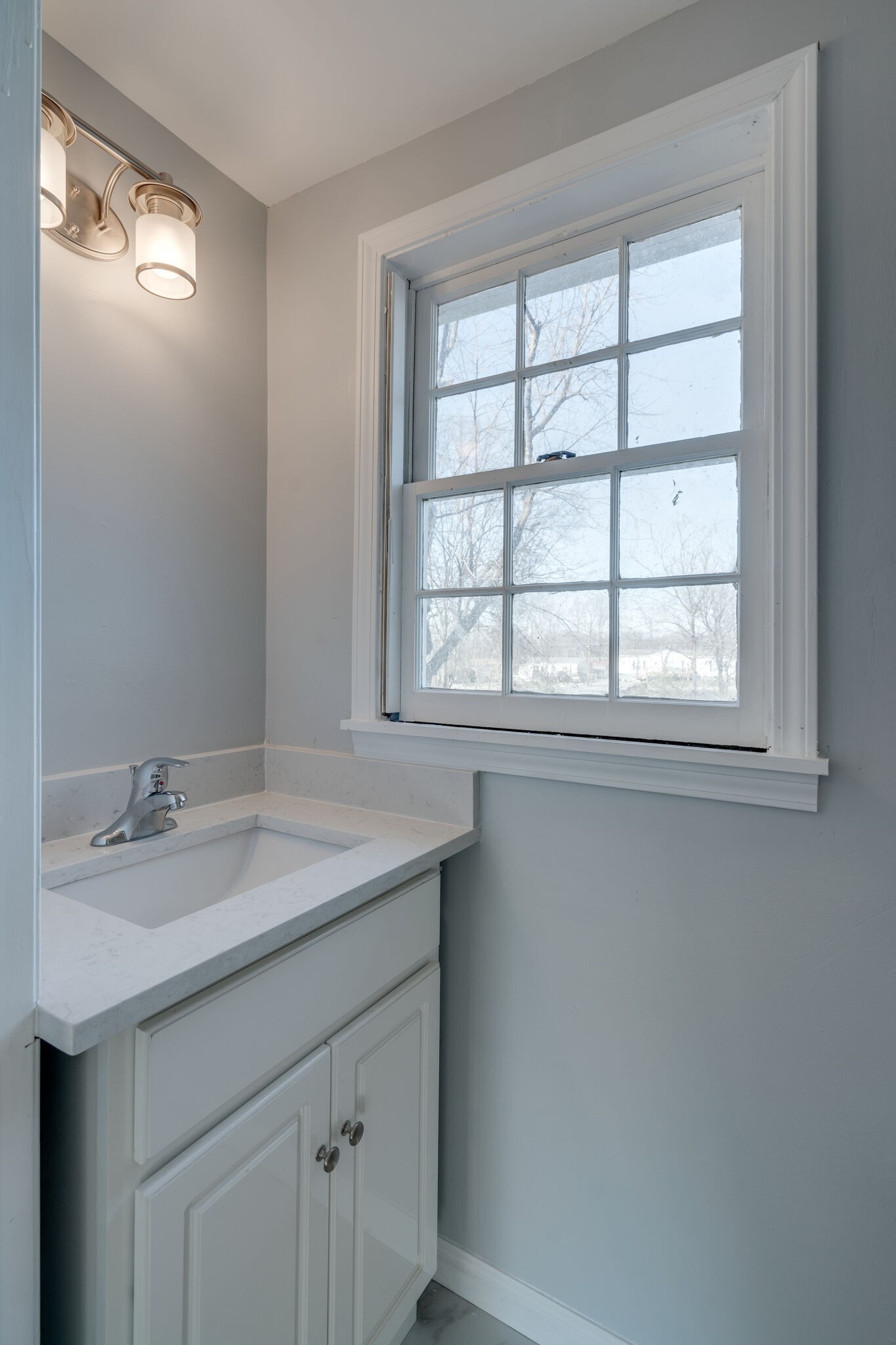 706 Pace Street Gallatin, TN 37066 - Photo 17 of 20 a bathroom with a sink and a window