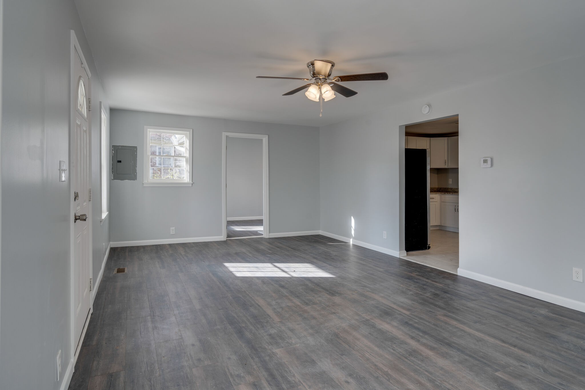 706 Pace Street Gallatin, TN 37066 - Photo 5 of 20 a view of an empty room with wooden floor