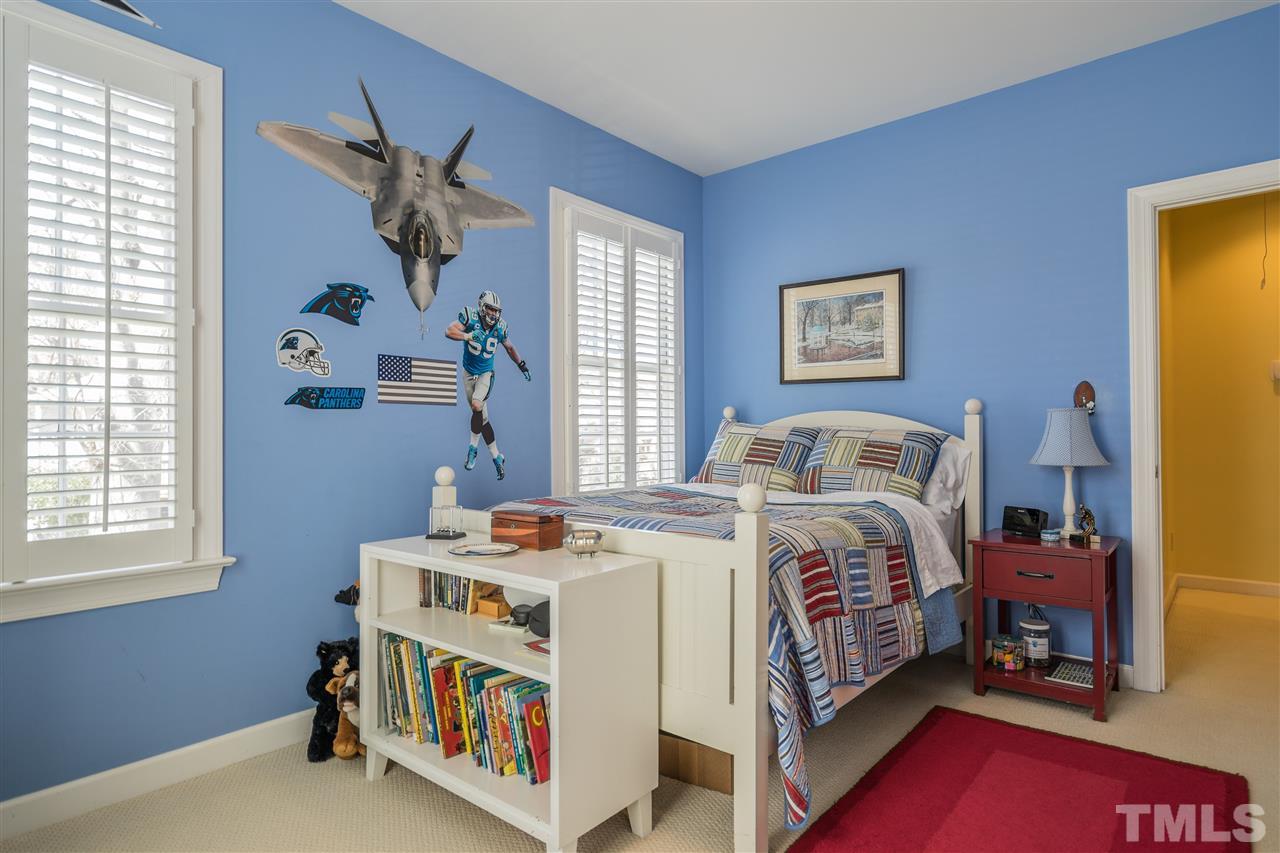 2808 Royster Street Raleigh, NC 27608 - Photo 19 of 25 a bedroom with bed and a window