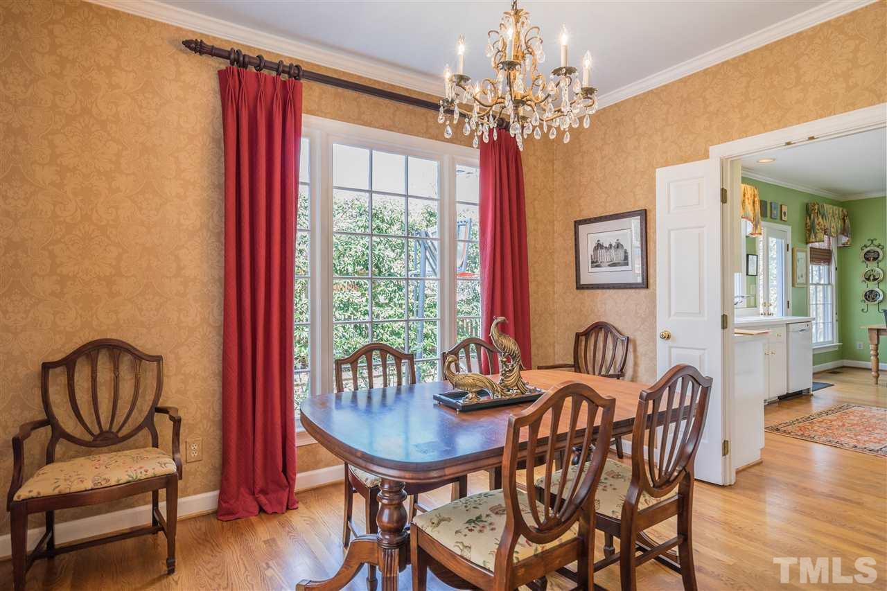 2808 Royster Street Raleigh, NC 27608 - Photo 5 of 25 a view of a dining room with furniture window and outside view