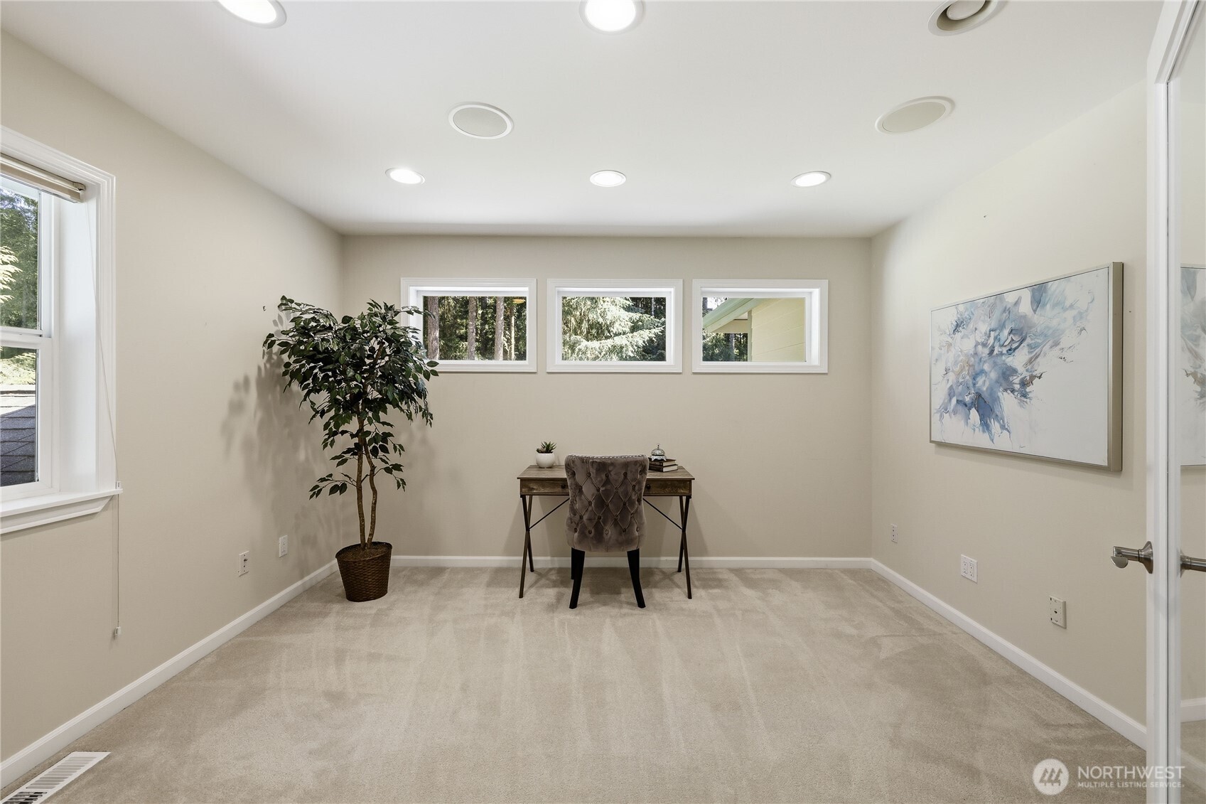 4354 Northwest Westgate Road Silverdale, WA 98383 - Photo 20 of 40 a view of a workspace with furniture and a potted plant