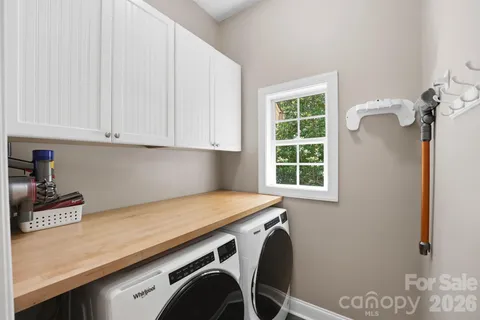 a view of a kitchen with washing machine
