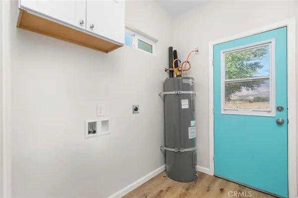 a view of a hallway with front door