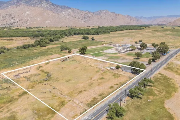 a view of an swimming pool and a mountain