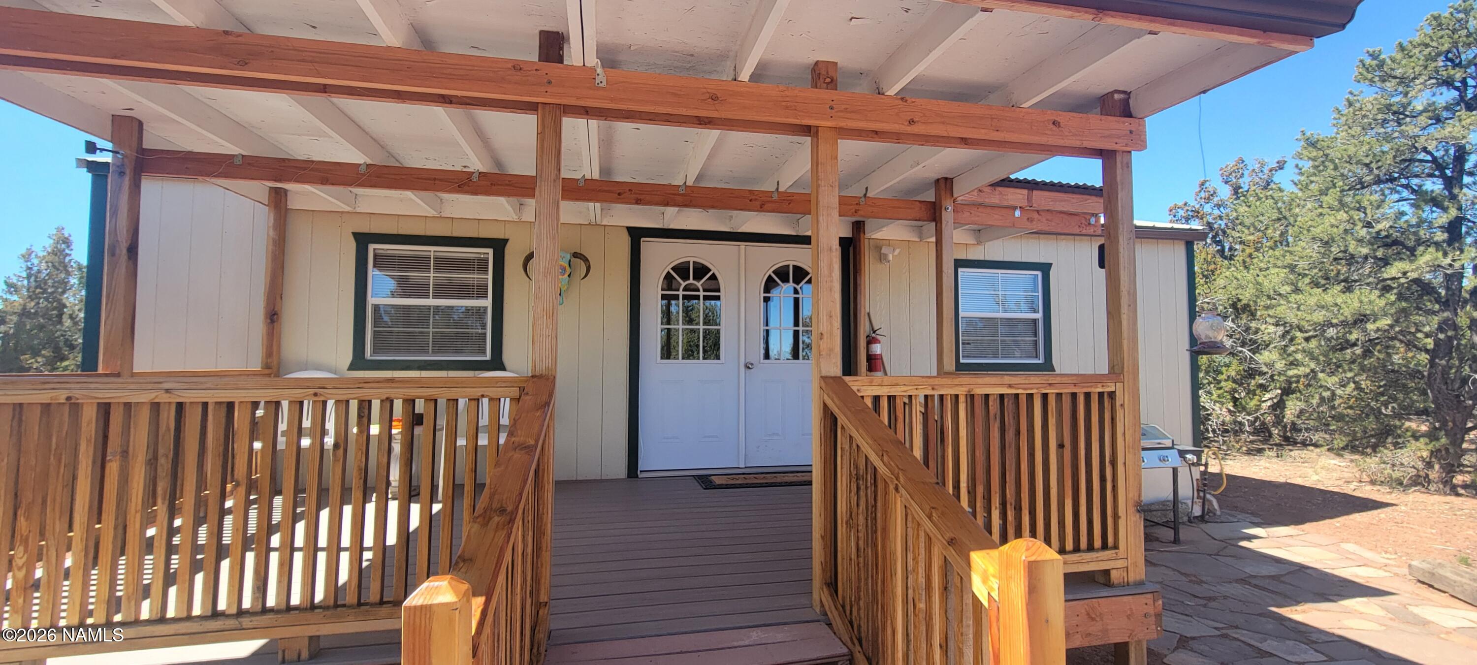 4650 Juniper Road Williams, AZ 86046 - Photo 16 of 28 a front view of a house