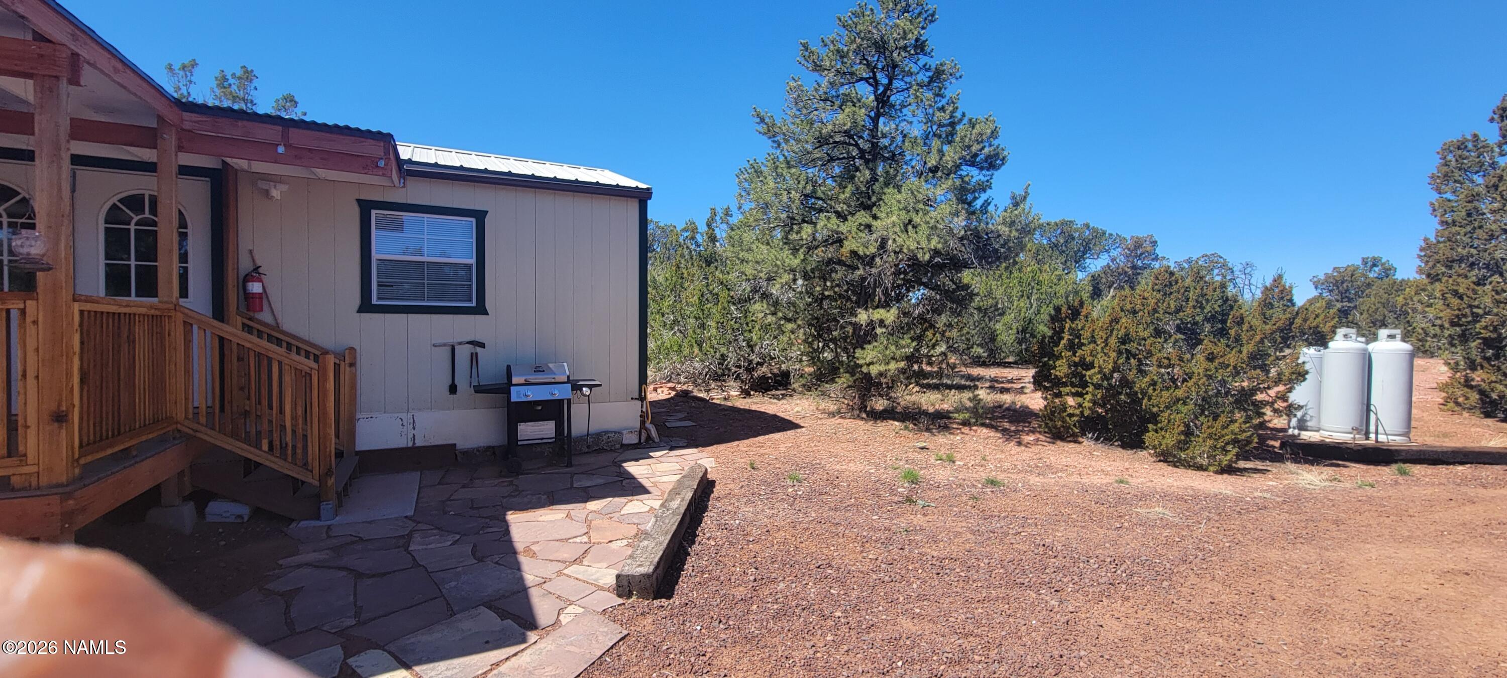 4650 Juniper Road Williams, AZ 86046 - Photo 18 of 28 a view of a back yard of the house