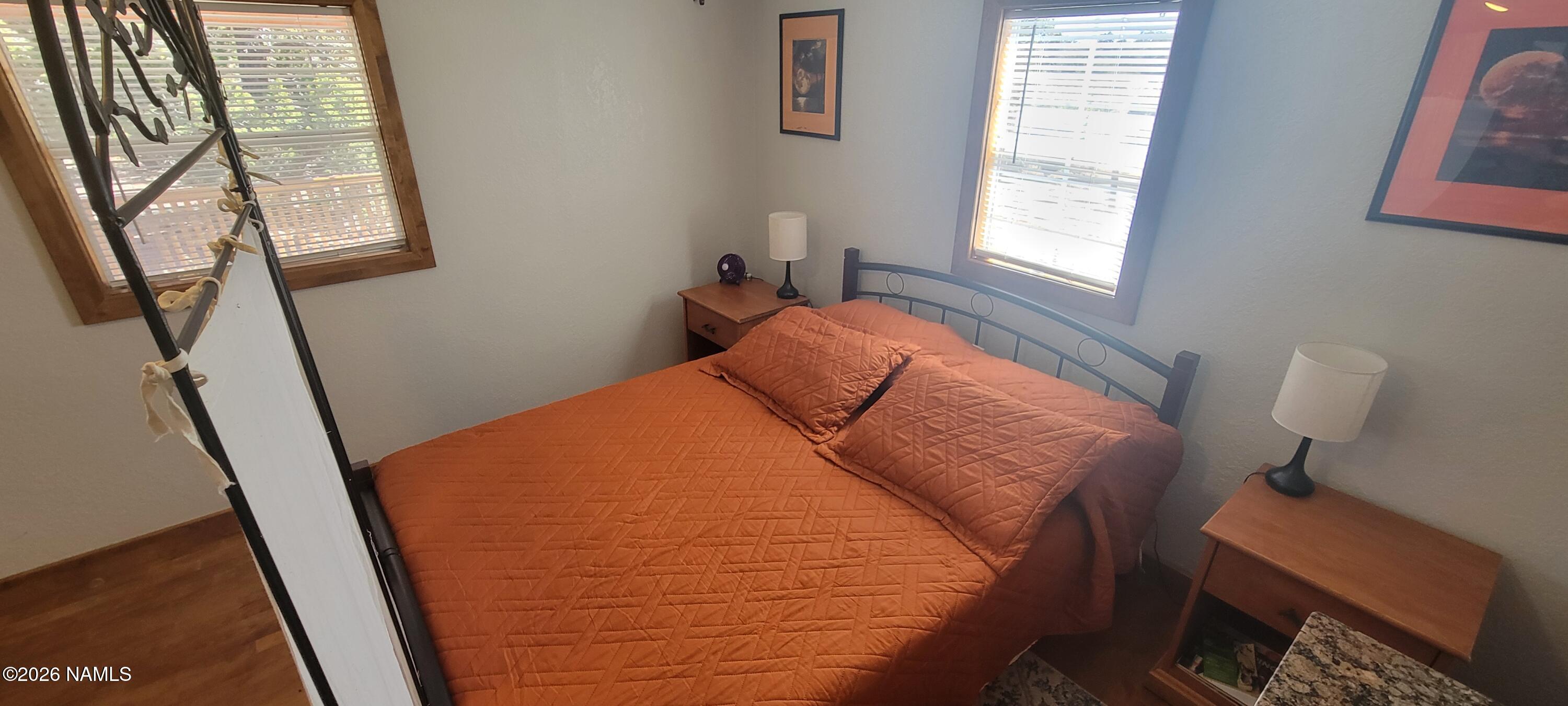 4650 Juniper Road Williams, AZ 86046 - Photo 8 of 28 a bedroom with a bed and a window