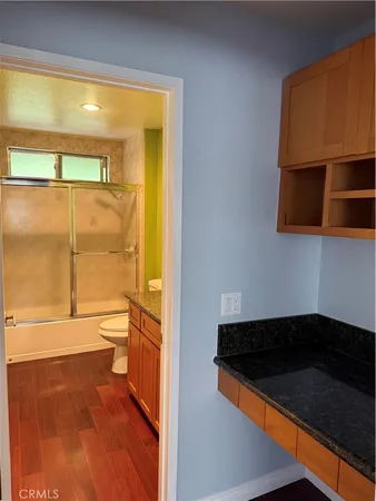 a view of a living room with a large window