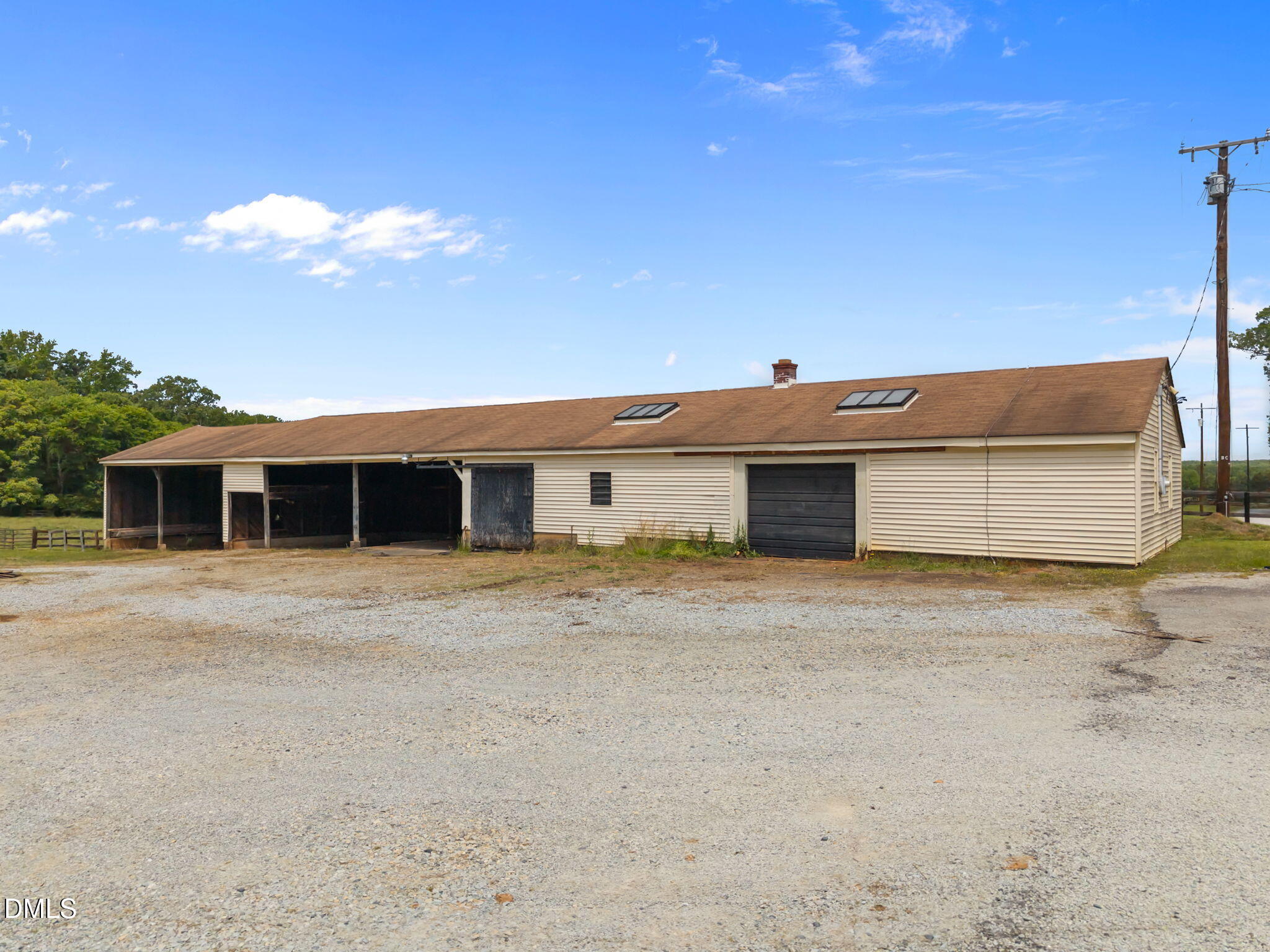 423 Quail Roost Farm Road Rougemont, NC 27572 - Photo 27 of 44 a view of a house with a yard