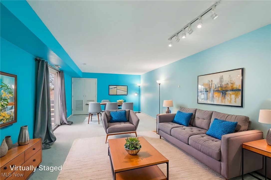 3484 Mayfield Road, Unit 3426 Cleveland Heights, OH 44118 - Photo 25 of 33 Carpeted living room featuring rail lighting