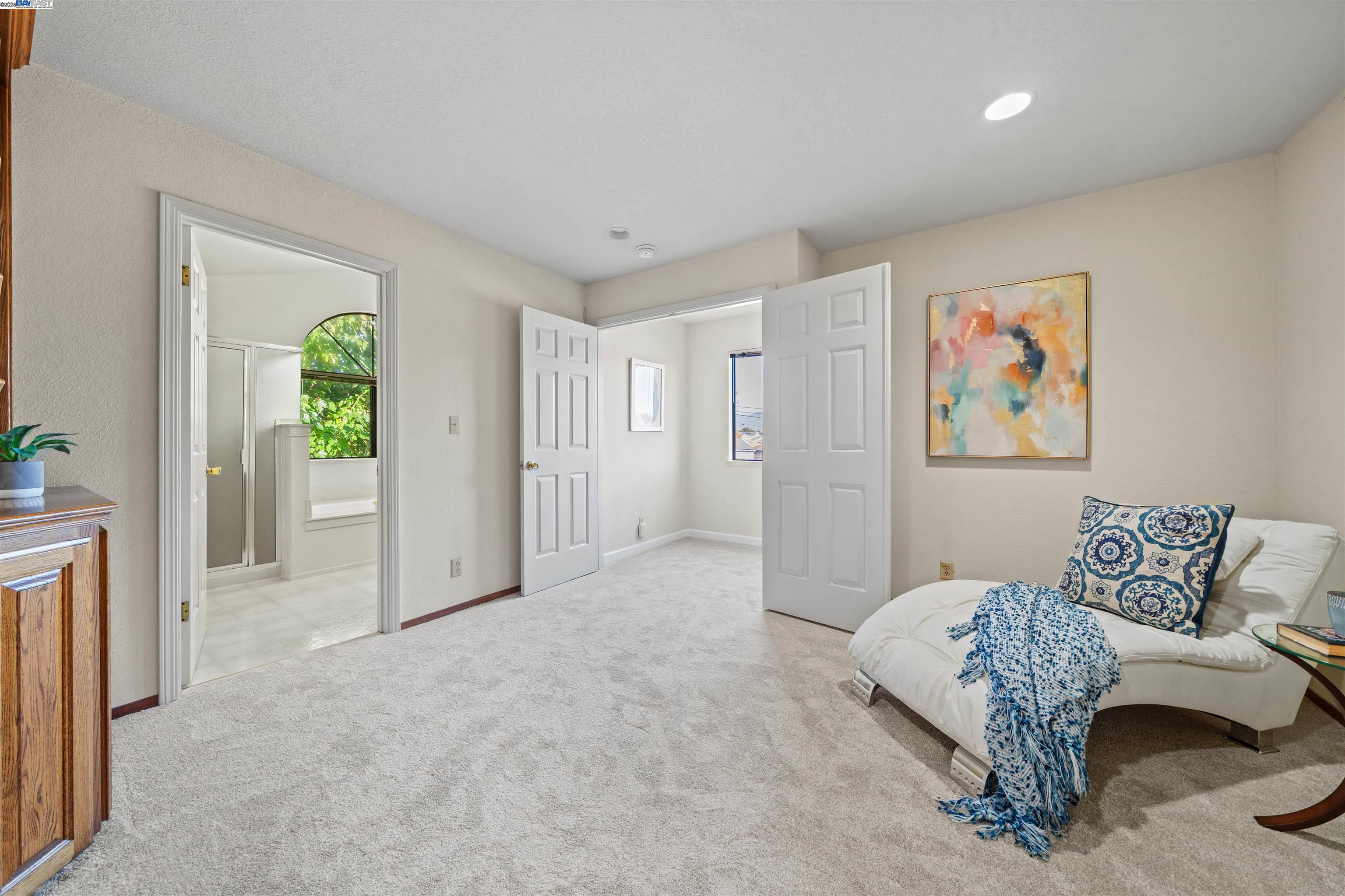 3393 Sutton Loop Fremont, CA 94536 - Photo 24 of 47 a view of a livingroom with furniture and windows
