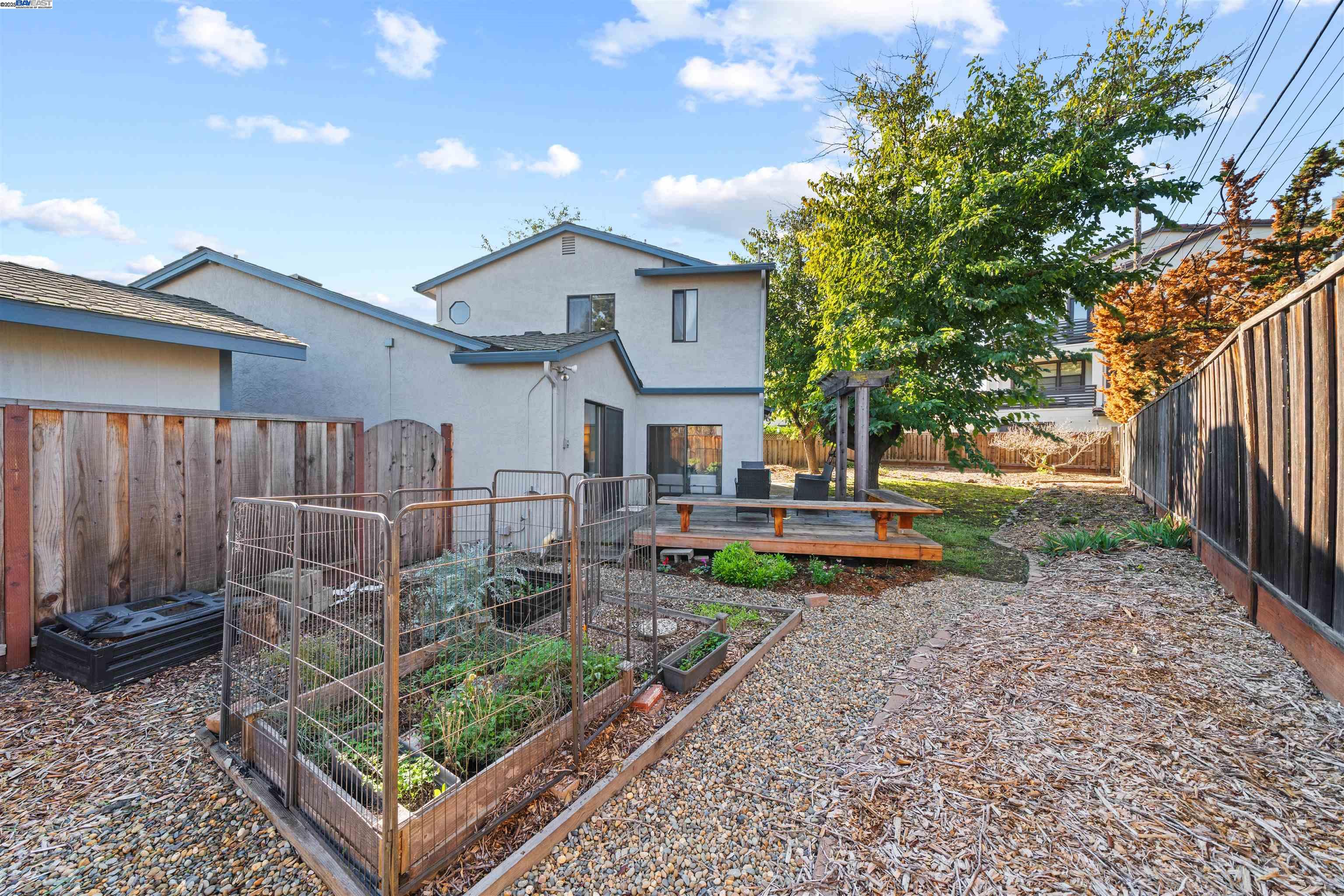3393 Sutton Loop Fremont, CA 94536 - Photo 30 of 47 a view of a chair and table in backyard