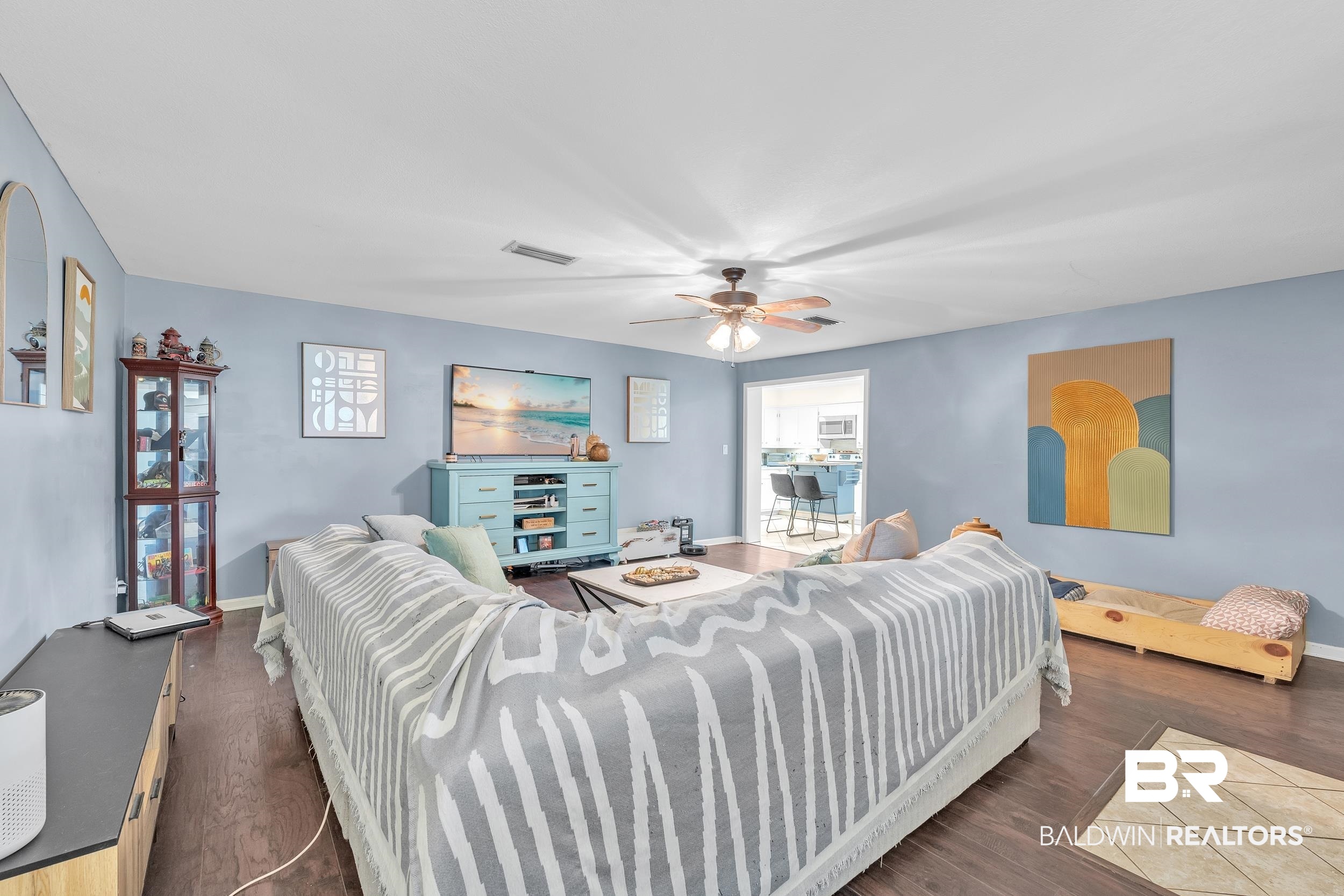 206 West Jackson Avenue Summerdale, AL 36580 - Photo 11 of 37 Living room with wood finished floors, a ceiling fan, and baseboards